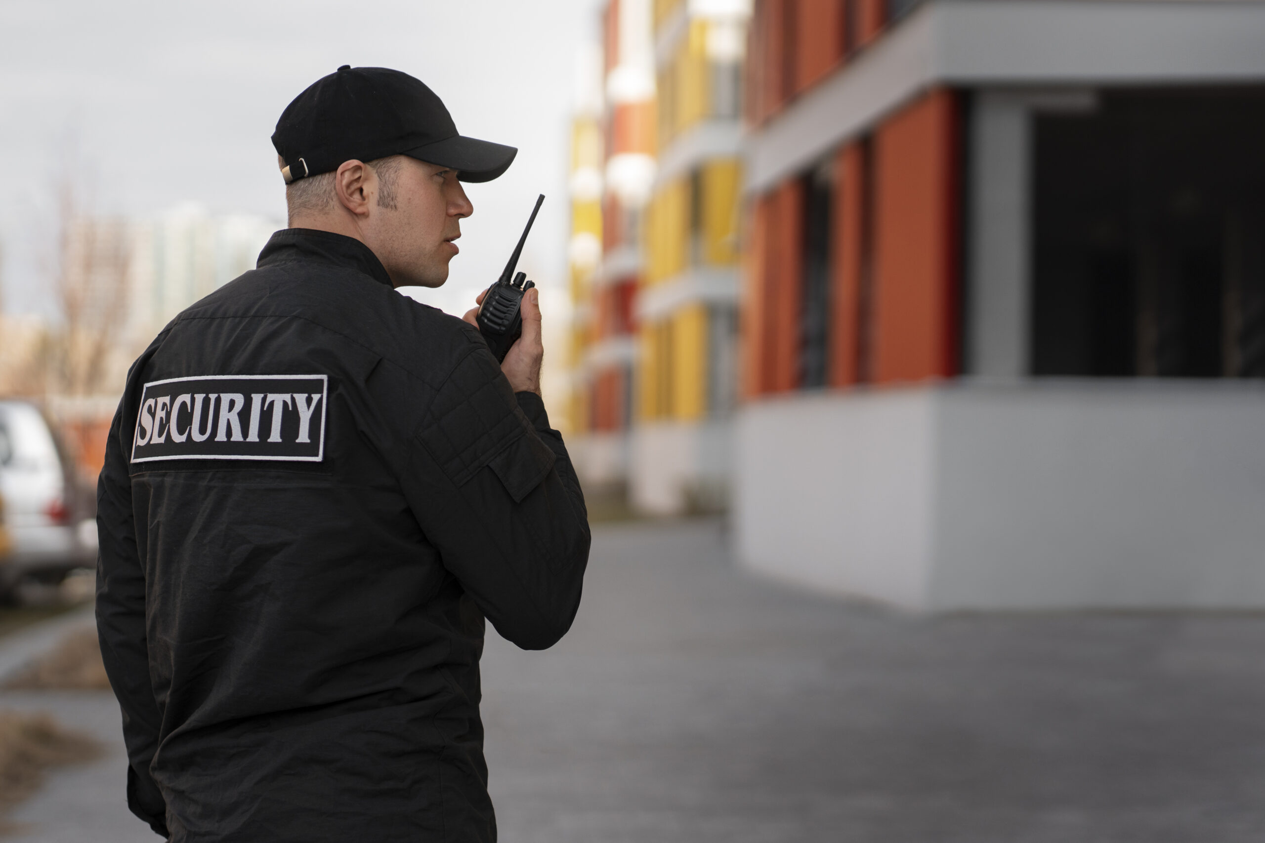 portrait-male-security-guard-with-radio-station
